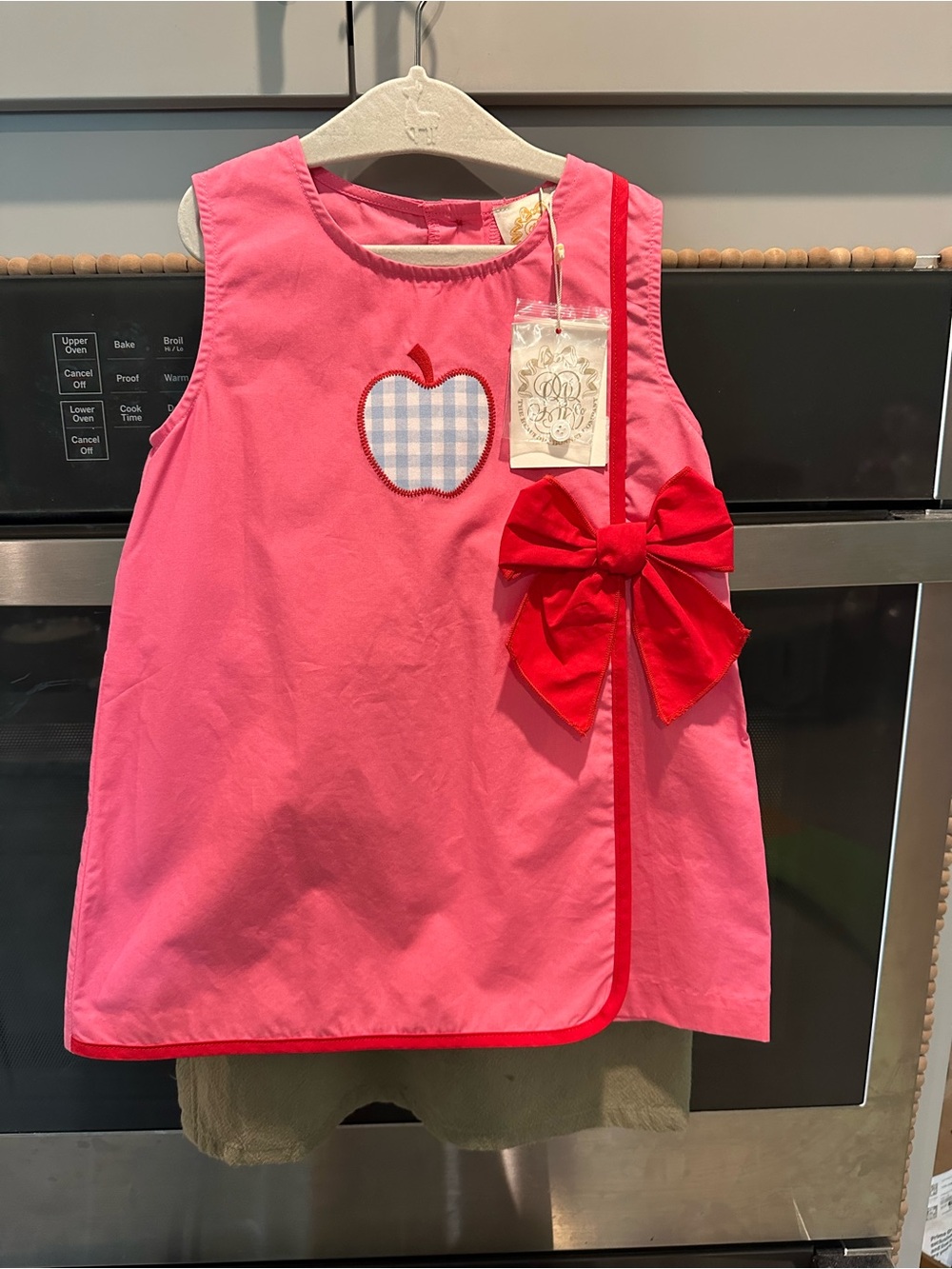 The Beaufort Bonnet Company Pink Dress with Red Bow and Gingham Apple